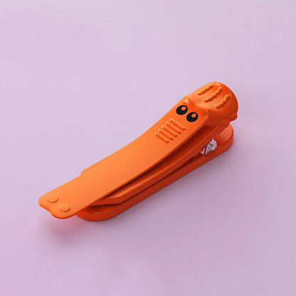 Croc Clip™ Segnalibro a clip in silicone antiscivolo (coccodrillo)